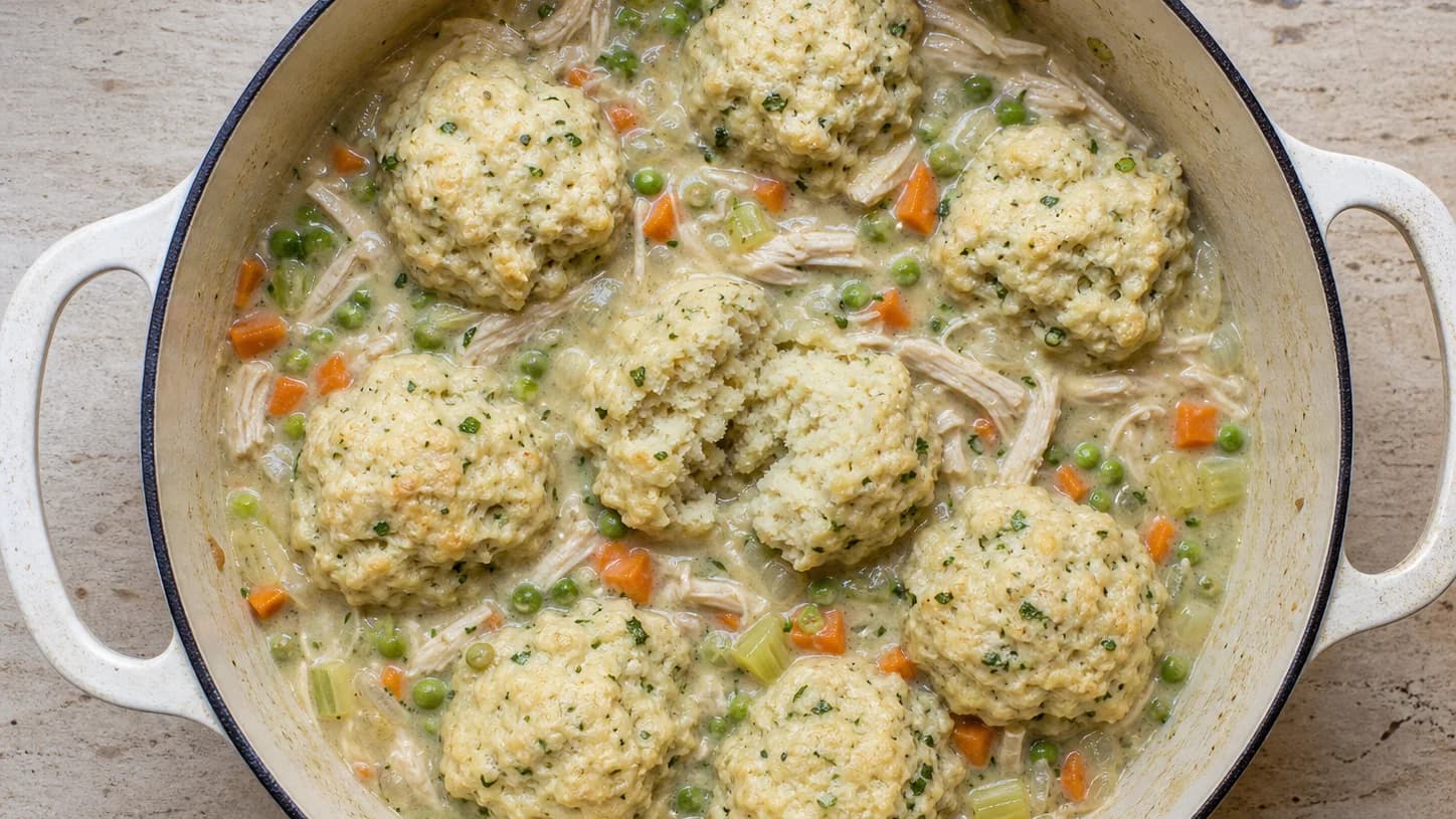 Overhead view of chicken & dumpling stew, served as a family dinner.